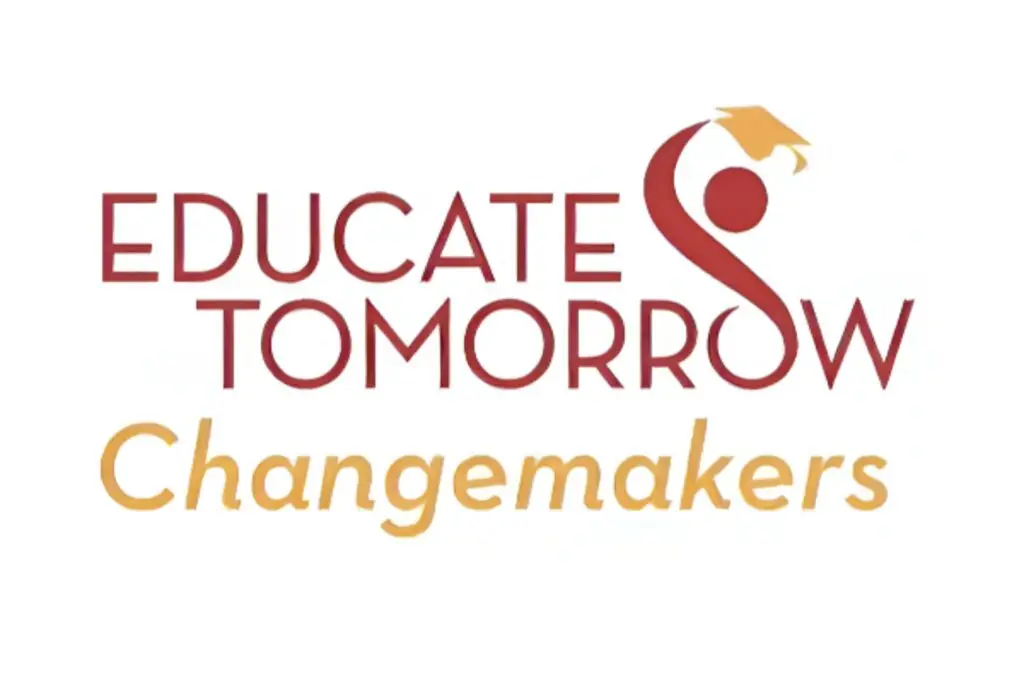 Logo with text Educate Tomorrow Changemakers. The word Tomorrow has a stylized figure in place of the first O, with a yellow graduation cap. Changemakers is in a script font below the main text.